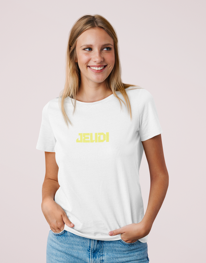 Model wearing KOULEURS JEUDI white unisex t-shirt with red embroidered lettering
