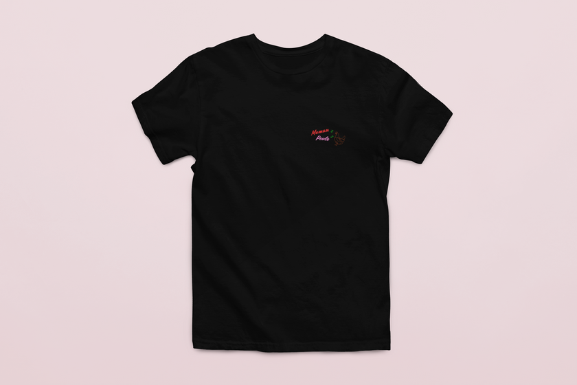 Minimalist black t-shirt with white “Maman Poule” graphic text – French-inspired women’s tee from KOULEURS